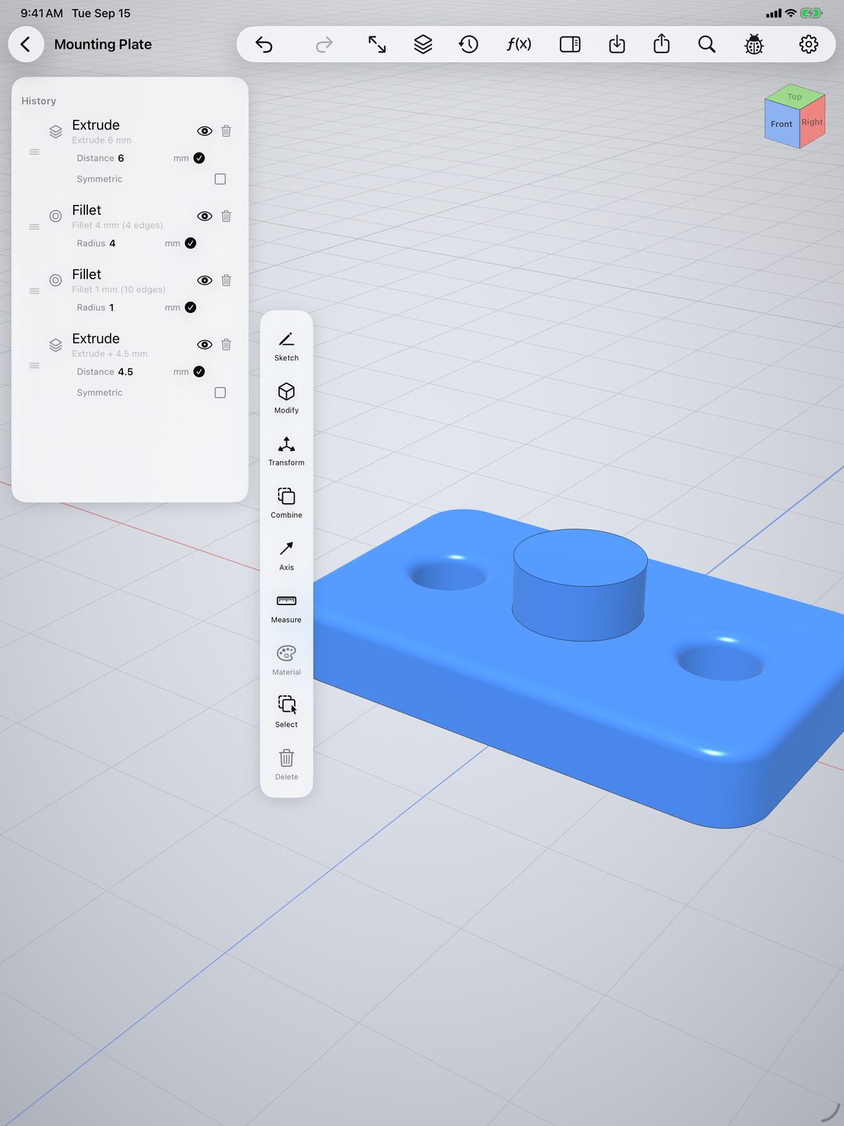 The feature history panel with editable extrude and fillet values